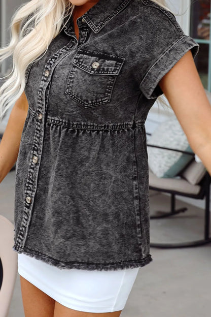 Black short sleeve denim shirt with flap pockets, button-up front, and raw hem from Trendsi.