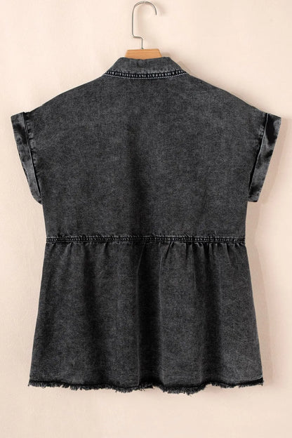 Black short sleeve denim shirt by Trendsi with flap pockets, button-up front, and raw hem, displayed on a plain background.