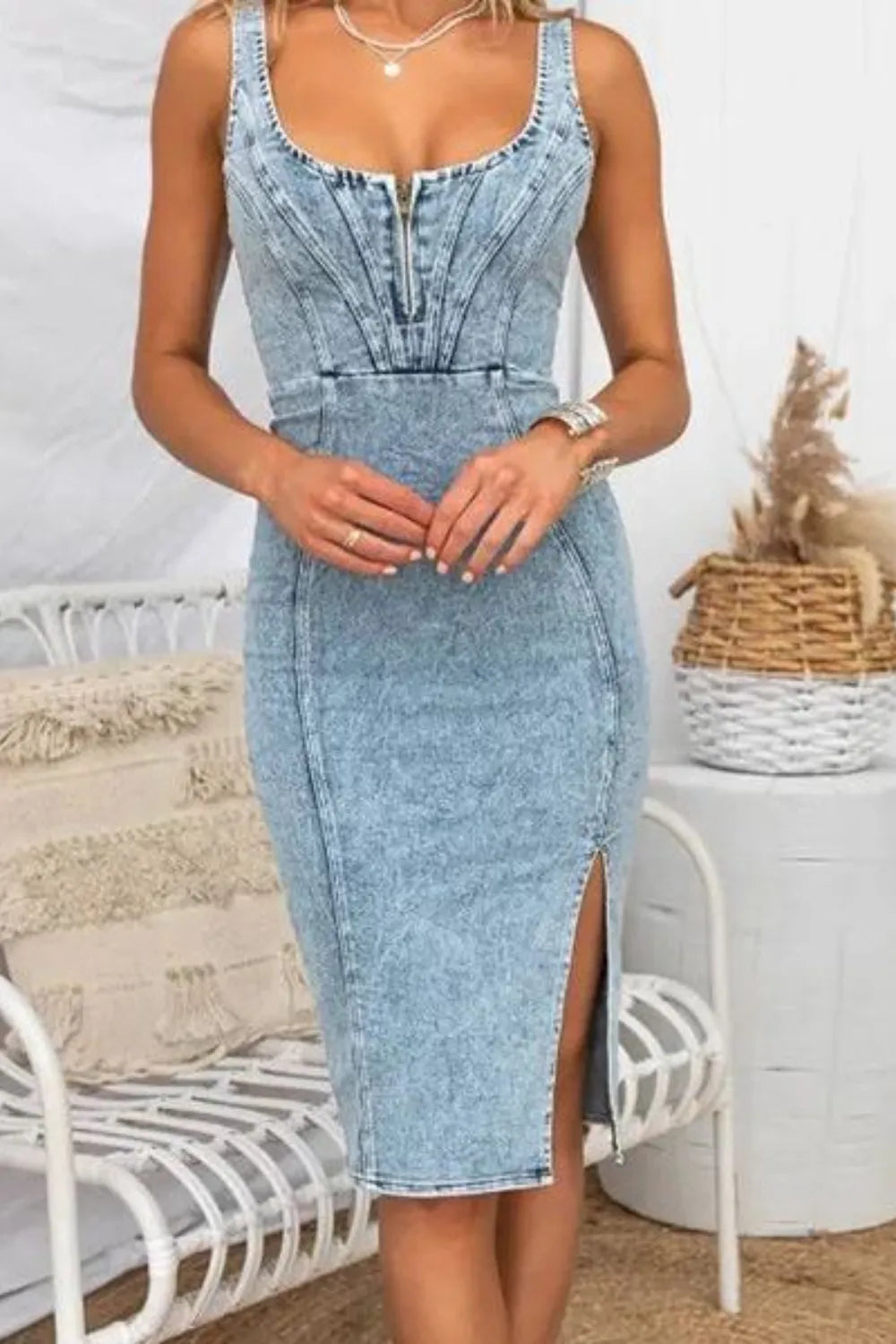 Black washed denim dress with a scoop neck and side slit, featuring a casual and stylish fit from Trendsi.