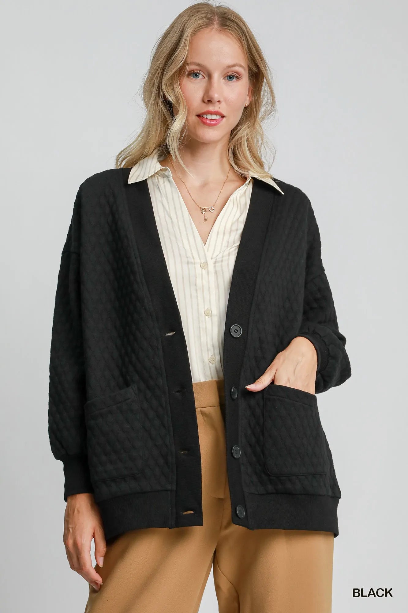 Black Umgee button-up jacquard cardigan with intricate woven pattern, styled for a cozy, fashionable look.