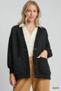 Black Umgee button-up jacquard cardigan with intricate woven pattern, styled for a cozy, fashionable look.