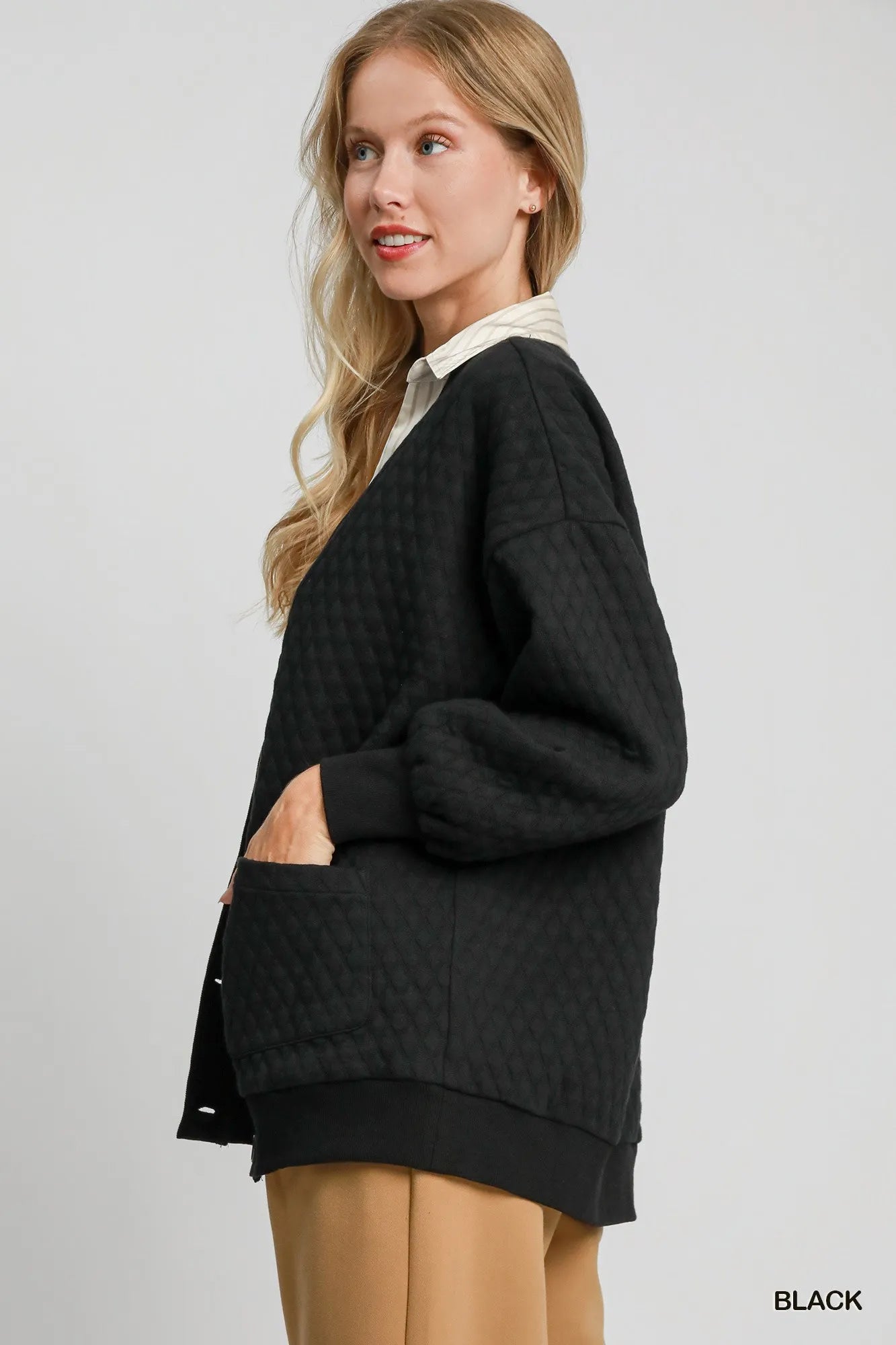 Black Umgee button-up jacquard cardigan with intricate woven pattern, long sleeves, and front buttons, casual and stylish for layering.