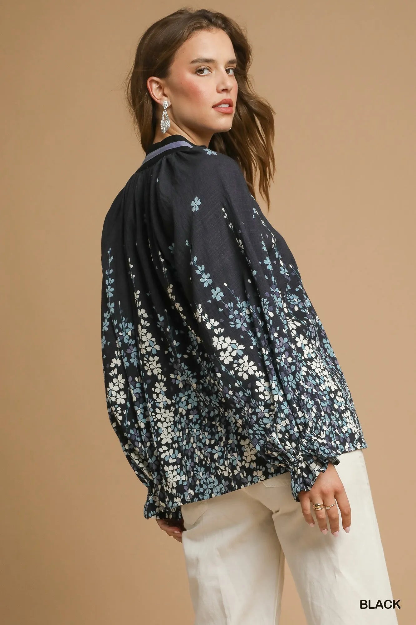 Plus size black floral vine print blouse by Umgee with balloon sleeves, featuring a full-size fit and stylish design.