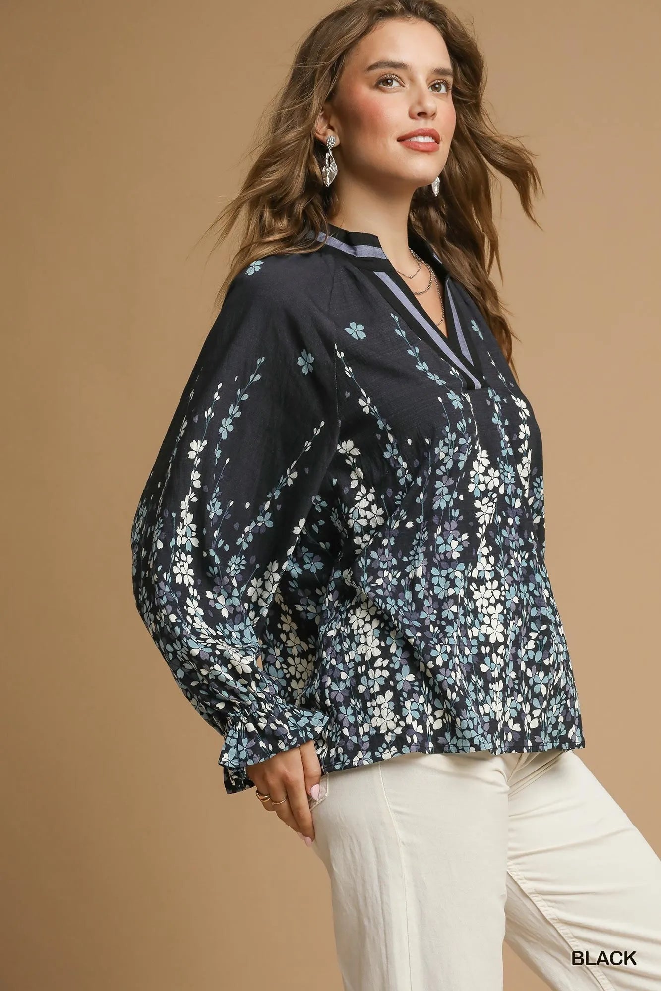 Plus size Umgee floral vine print blouse with balloon sleeves, featuring a full-size fit in black from Trendsi.