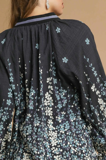 Plus size black floral vine print blouse with balloon sleeves by Umgee, featuring a stylish, flowy design and vibrant pattern.
