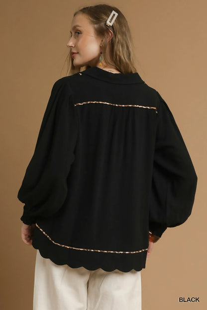 Black plus size linen blouse by Umgee with scallop hem and contrast trim, featuring a relaxed fit and stylish design.