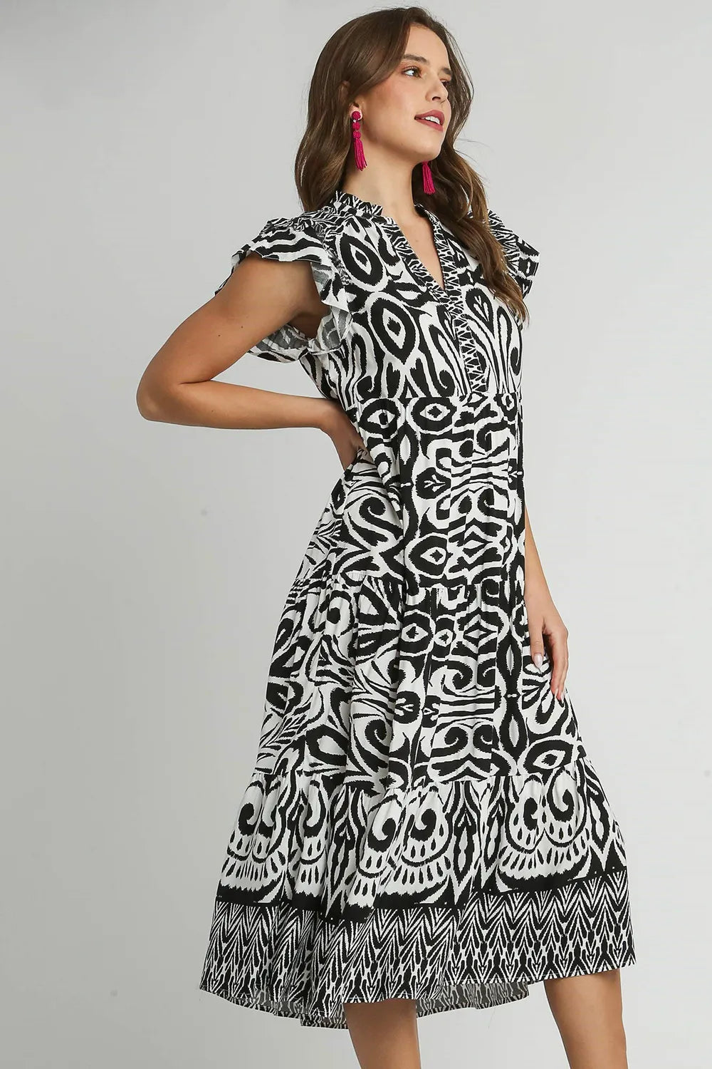 Plus size Umgee midi dress with two-tone border print, ruffle cap sleeves, and a stylish, comfortable fit.