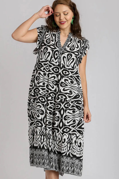 Umgee plus size midi dress with two-tone border print, ruffle cap sleeves, in black, perfect for casual or semi-formal wear.
