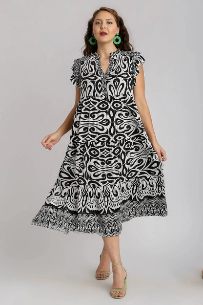 Plus size Umgee midi dress with two-tone border print, ruffle cap sleeves, and a stylish, flowy silhouette.