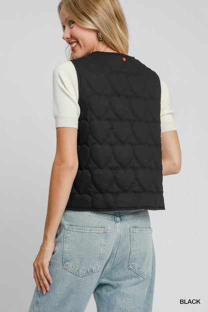 Black Umgee Heart Quilted Tie-Front Vest featuring a stylish quilted pattern and a front tie closure.