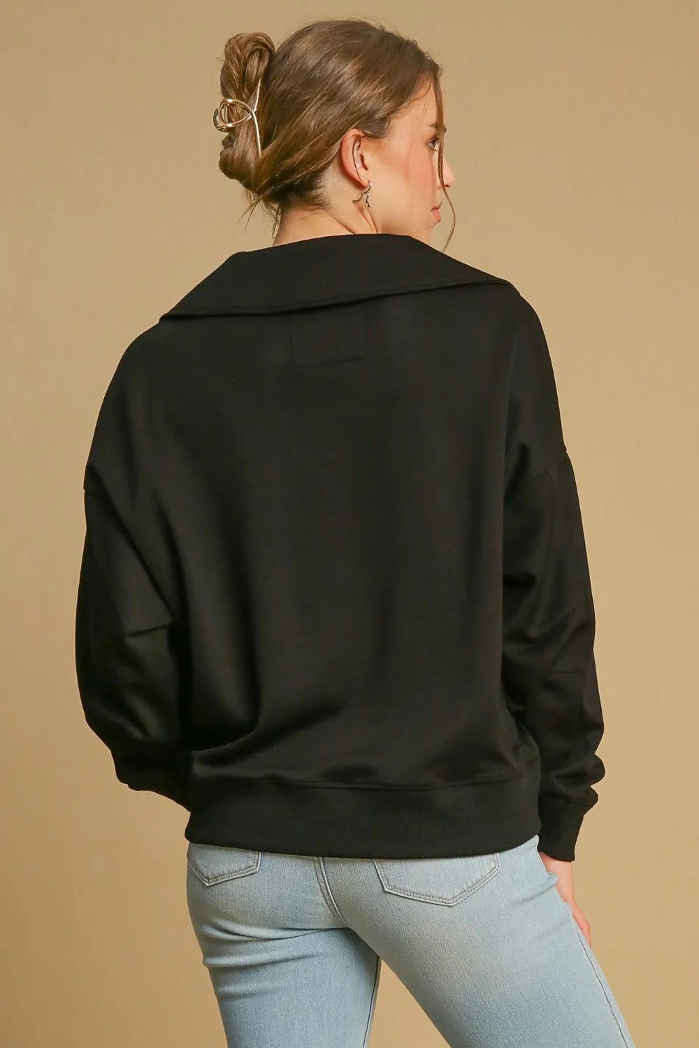 Black Umgee Johnny collar dropped shoulder sweatshirt with relaxed fit and cozy fabric, styled on a mannequin.