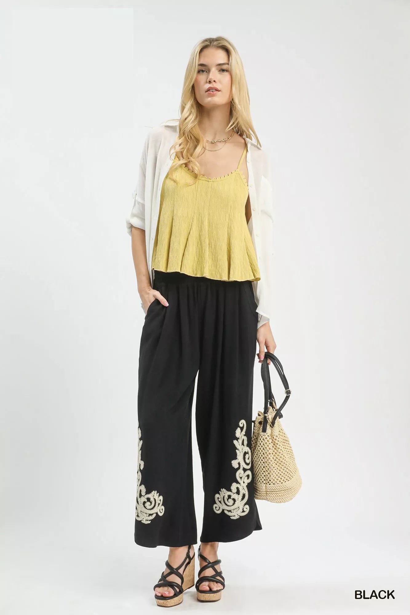Black Umgee linen embroidered wide-leg boho pants with relaxed fit and intricate embroidery, perfect for casual or bohemian styles.
