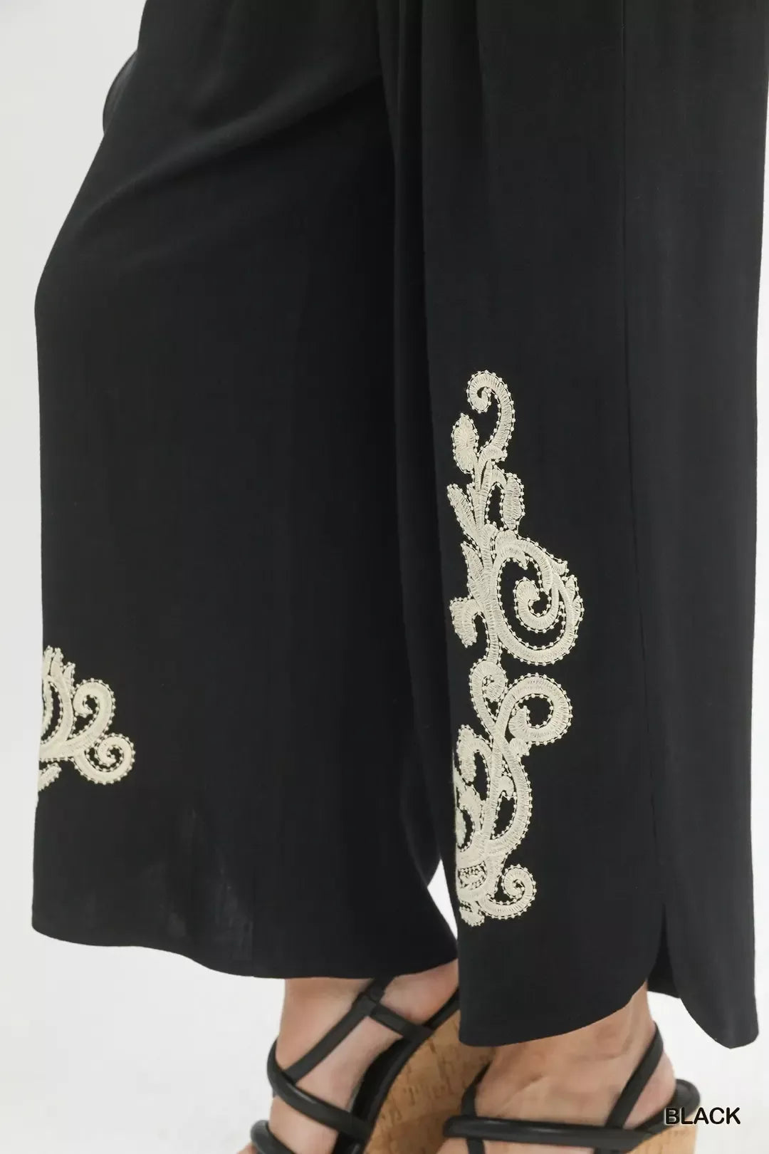Black linen embroidered wide-leg boho pants by Umgee, featuring relaxed fit and intricate embroidery detail.