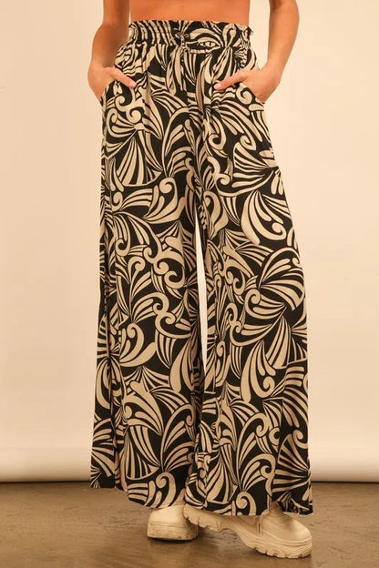 Plus size black printed wide leg pants from VERY J by Trendsi, full-length, comfortable fit, stylish and flowy design.