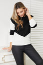 Black woven two-tone openwork rib-knit sweater from Trendsi, featuring a stylish open-knit design and cozy fit.