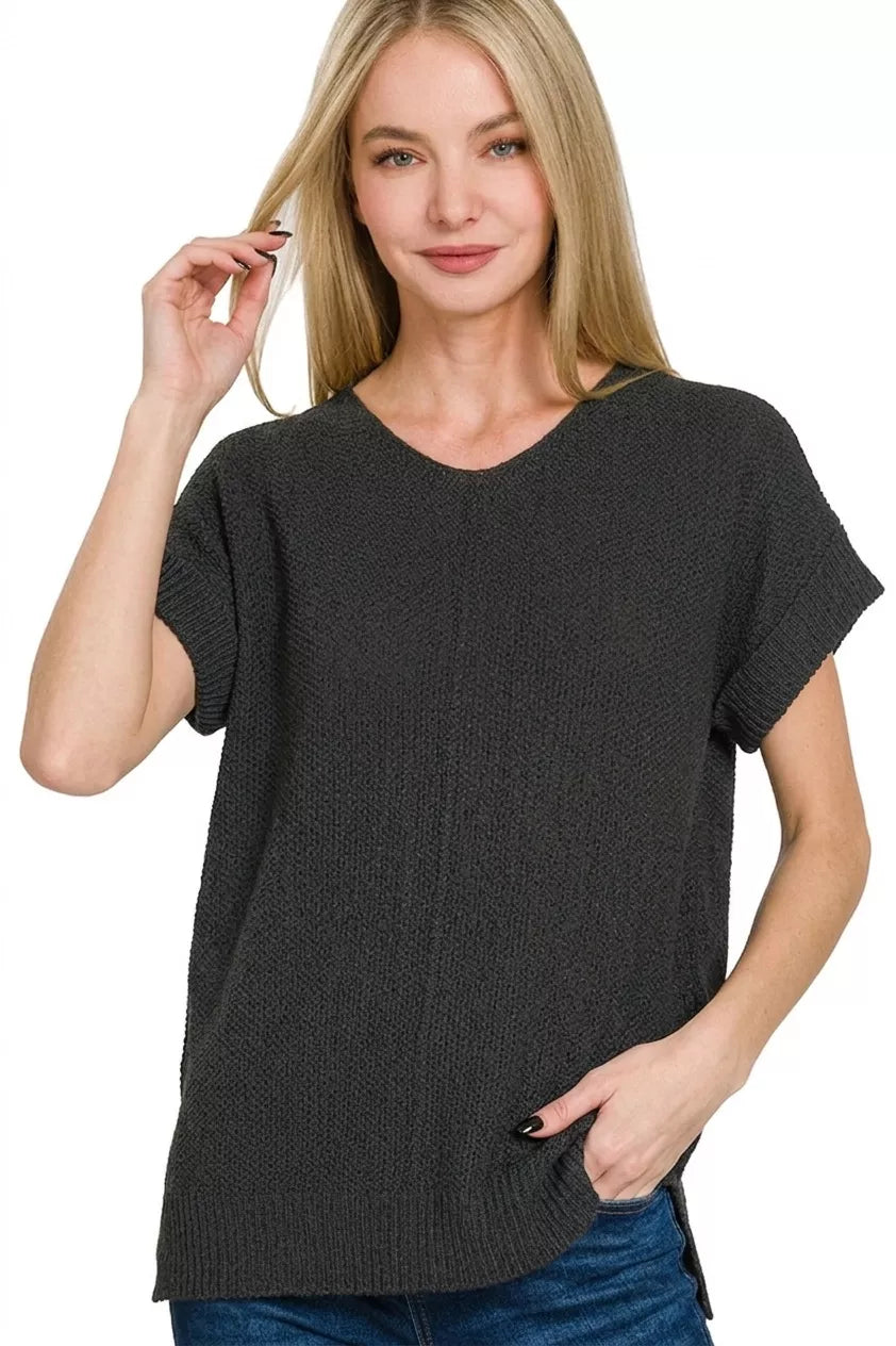 Black Zenana short sleeve sweater with a center seam, made by Trendsi, featuring a casual and comfortable knit design.