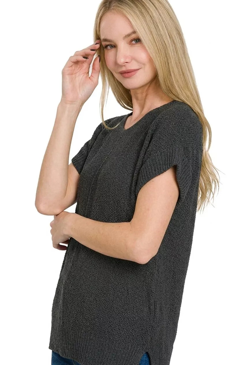 Black Zenana center seam short sleeve sweater from Trendsi, featuring a classic fit and soft knit fabric.