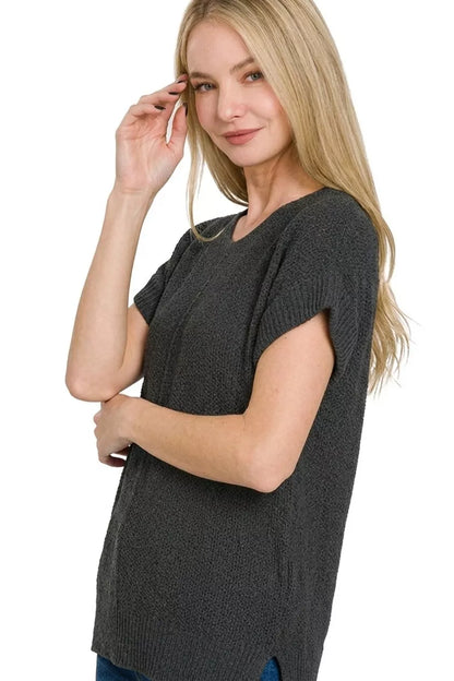 Black Zenana center seam short sleeve sweater from Trendsi, featuring a classic fit and soft knit fabric.