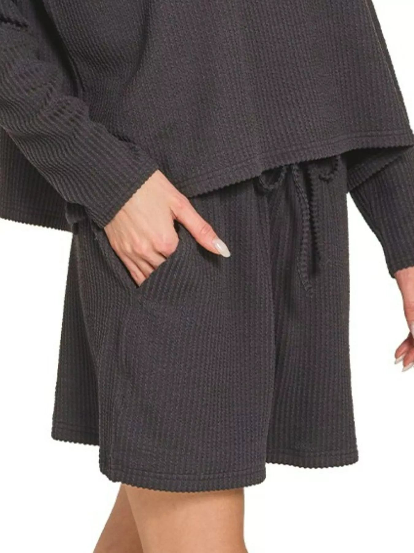 Black Zenana corded rib long sleeve tee and shorts set with a relaxed fit, featuring ribbed fabric and casual style.