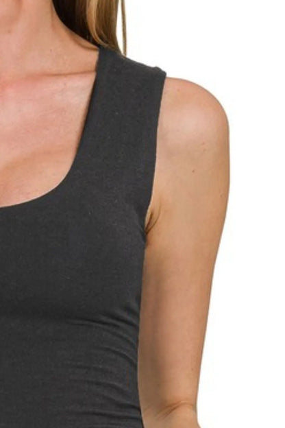 Black Zenana double layered cropped tank top from Trendsi, showcasing its layered design and sleeveless fit.