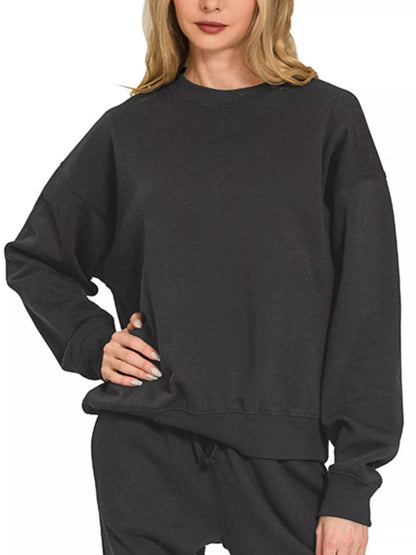 Black Zenana fleece long sleeve pullover and jogger set, comfy loungewear with soft fabric and casual fit.