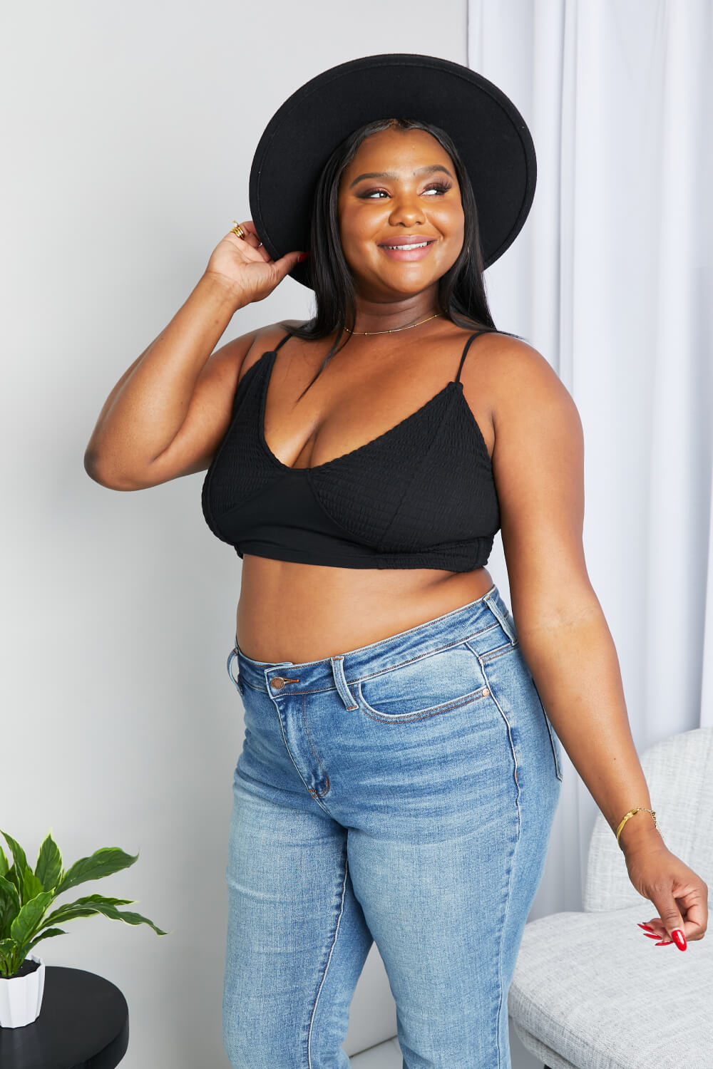 Black Zenana full-size textured spaghetti strap bralette with thin adjustable straps and subtle textured fabric.