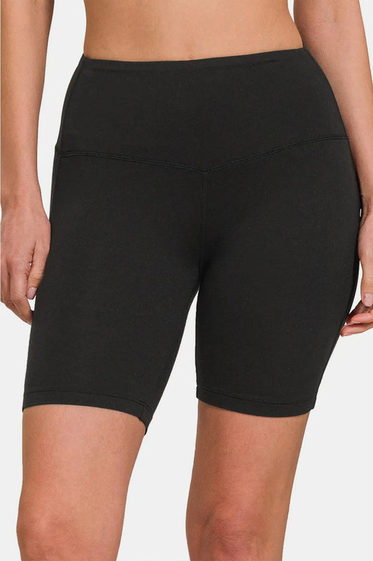 Black Zenana high waist active shorts from Trendsi, featuring a comfortable fit and sporty design for workouts and casual wear.