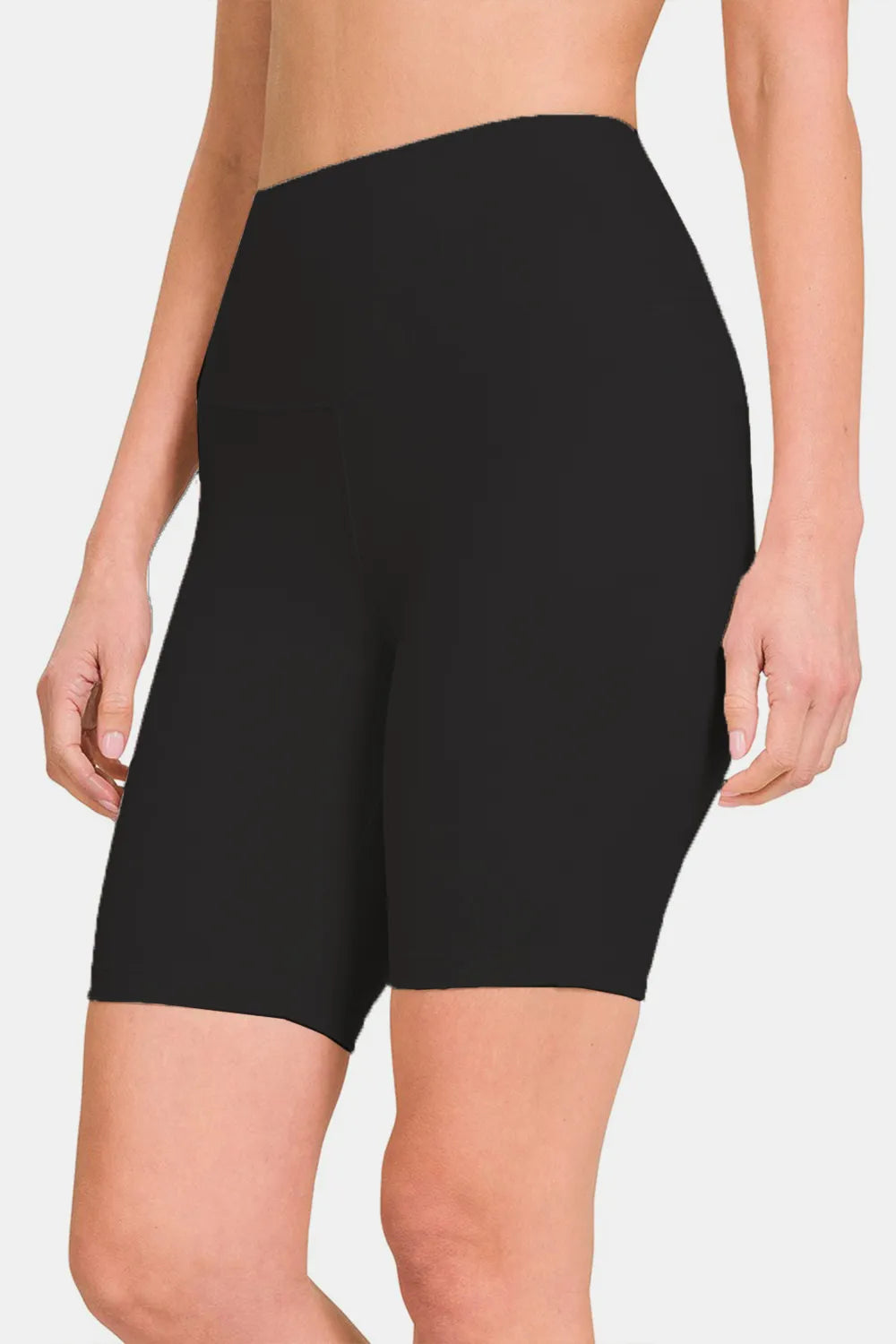 Black Zenana high waist active shorts by Trendsi, shown on a model, featuring a comfortable fit and sporty design for workouts.