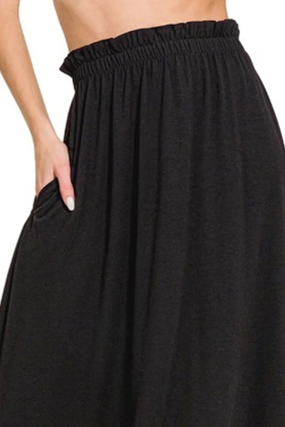 Black Zenana paperbag waist midi skirt with pockets, featuring a stylish and comfortable design with a relaxed fit.
