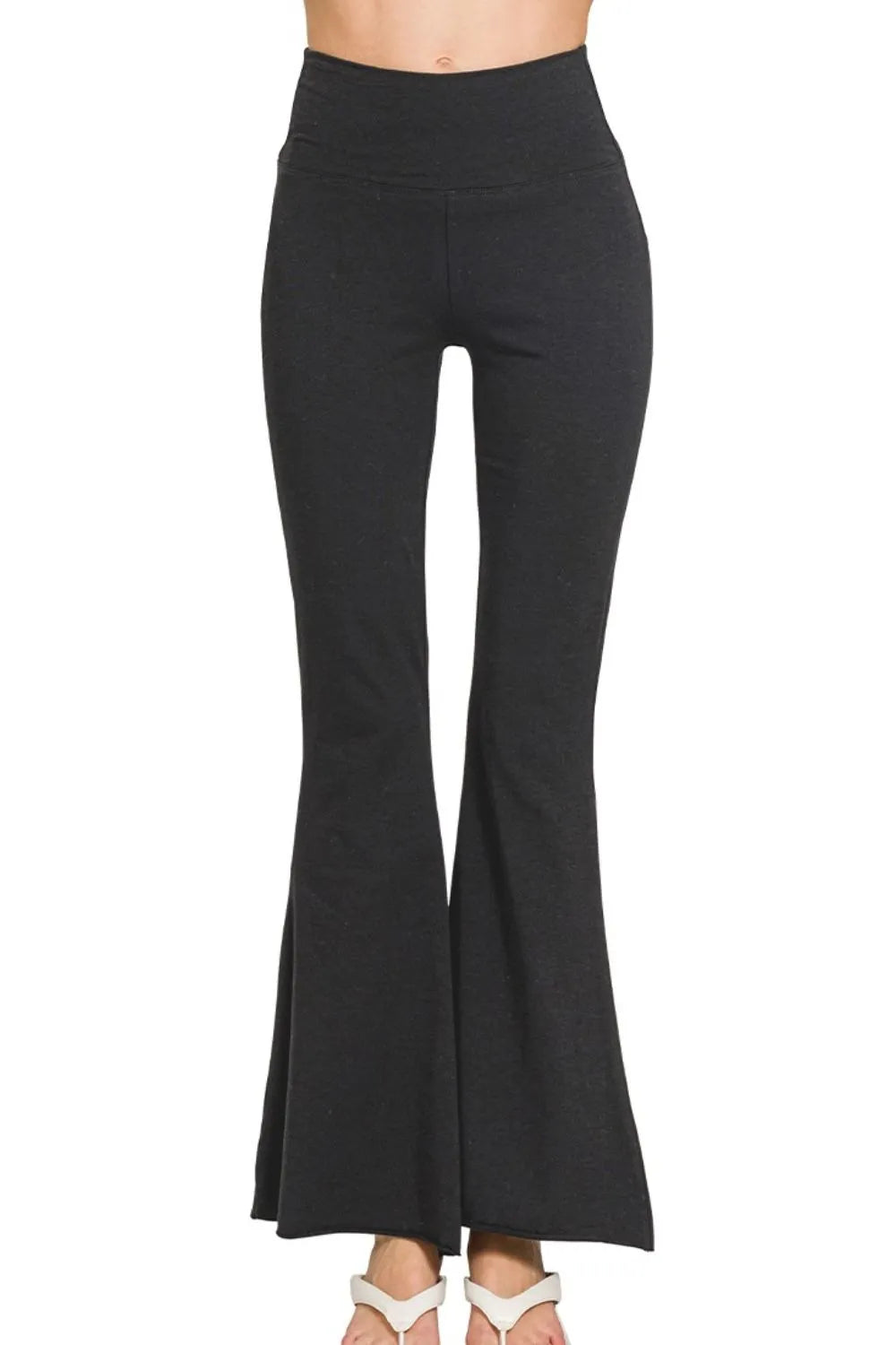 Black Zenana Raw Edge Hem Flare Yoga Pants with relaxed fit and stylish raw hem, perfect for comfortable activewear.
