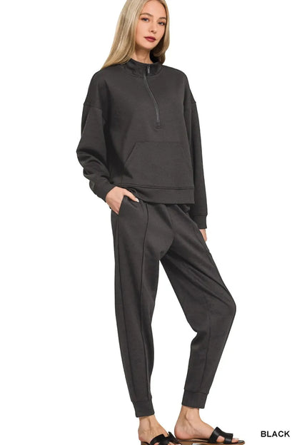 Black Zenana scuba half-zip sweatshirt and joggers set from Trendsi, featuring a comfortable, casual athletic style.
