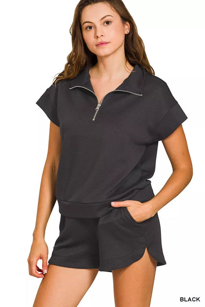 Black Zenana scuba high neck half zip top and dolphin shorts set, stylish activewear for women, by Trendsi.
