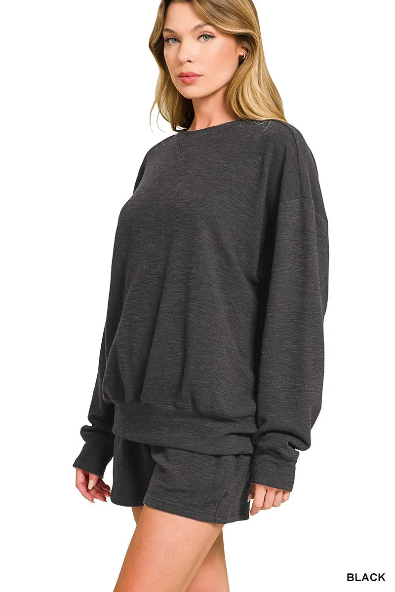 Black Zenana slub long sleeve top and shorts set by Trendsi, casual loungewear with relaxed fit and comfortable fabric.