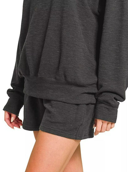 Black Zenana slub long sleeve top and shorts set from Trendsi, casual loungewear with relaxed fit and comfortable fabric.