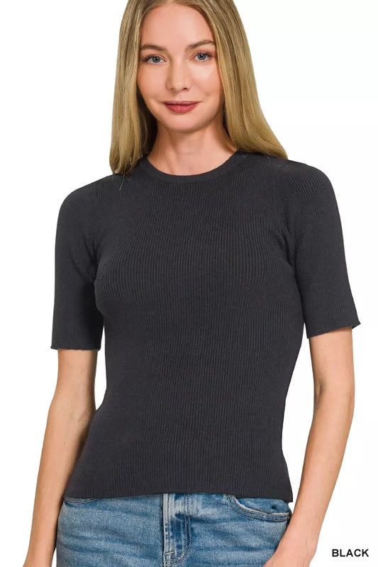 Black Zenana viscose ribbed round neck sweater with long sleeves, shown on a model, featuring a cozy, fitted design.