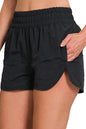 Black Zenana windbreaker running shorts with smocked waistband and relaxed fit, designed for comfortable active wear.