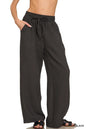 Black Zenana woven crepe elastic band pants with a relaxed fit and comfortable waistband, shown on a model.