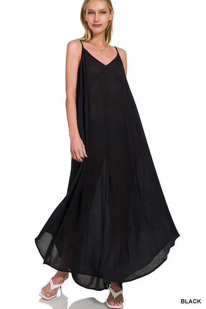 Black Zenana woven crinkle cami maxi dress with side pockets, featuring a flowy silhouette and sleeveless design.