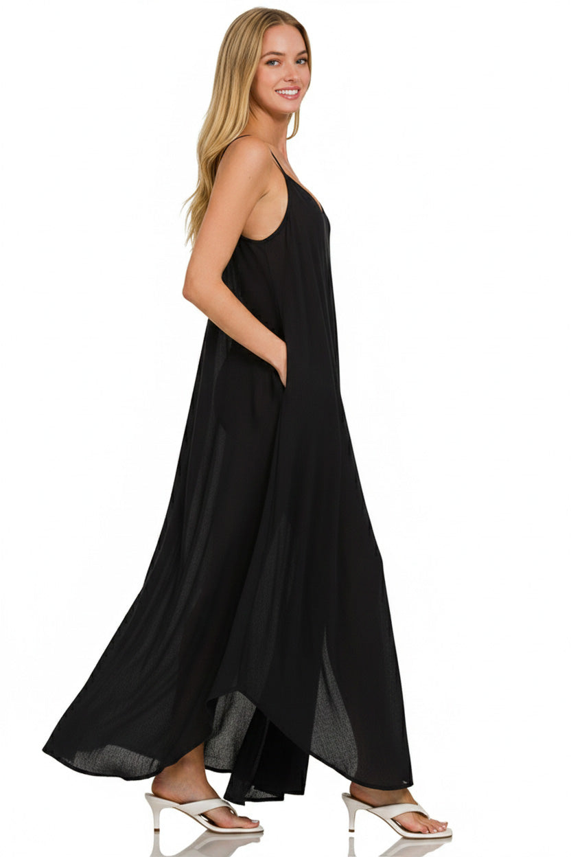 Black Zenana woven crinkle cami maxi dress with side pockets, featuring a relaxed fit and sleeveless design.