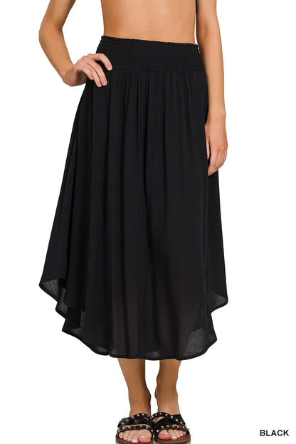 Black Zenana woven crinkle maxi skirt with smocked waist and pockets, featuring a flowing design and comfortable fit.