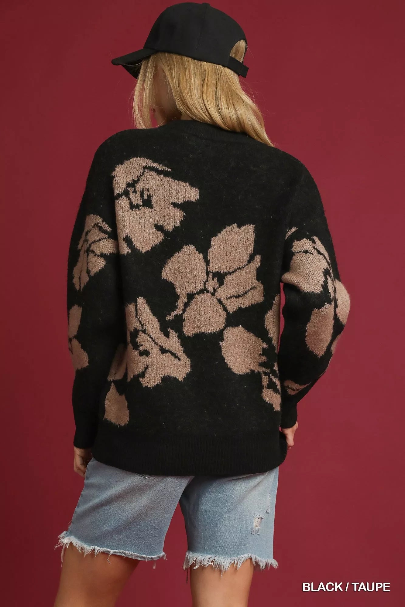 Black and taupe floral long sleeve sweater by Umgee featuring a cozy knit design and floral pattern, perfect for casual wear.