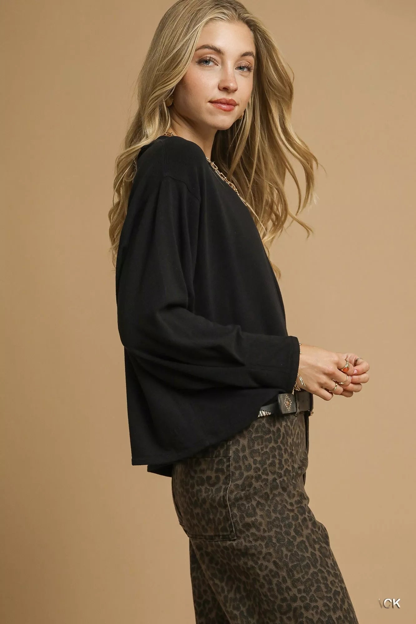 Black Umgee brushed fleece crewneck top with long sleeves, casual style, shown in size XS.