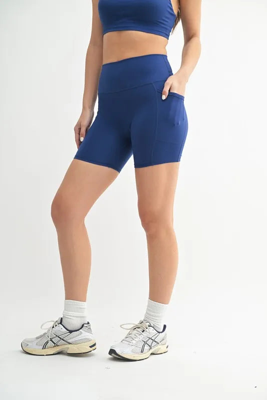 Blue MONO B Venice Cloud Light Sculpt Biker Shorts by Trendsi, featuring a snug fit and lightweight, breathable fabric for active wear.