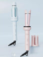 Blue automatic rotating ceramic hair curling iron with European plug by Trendsi, designed for easy, even curls.