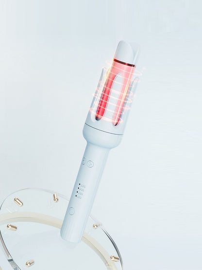 Blue Trendsi rotating ceramic hair curling iron with European plug, showcasing its ergonomic design and ceramic barrel for styling.