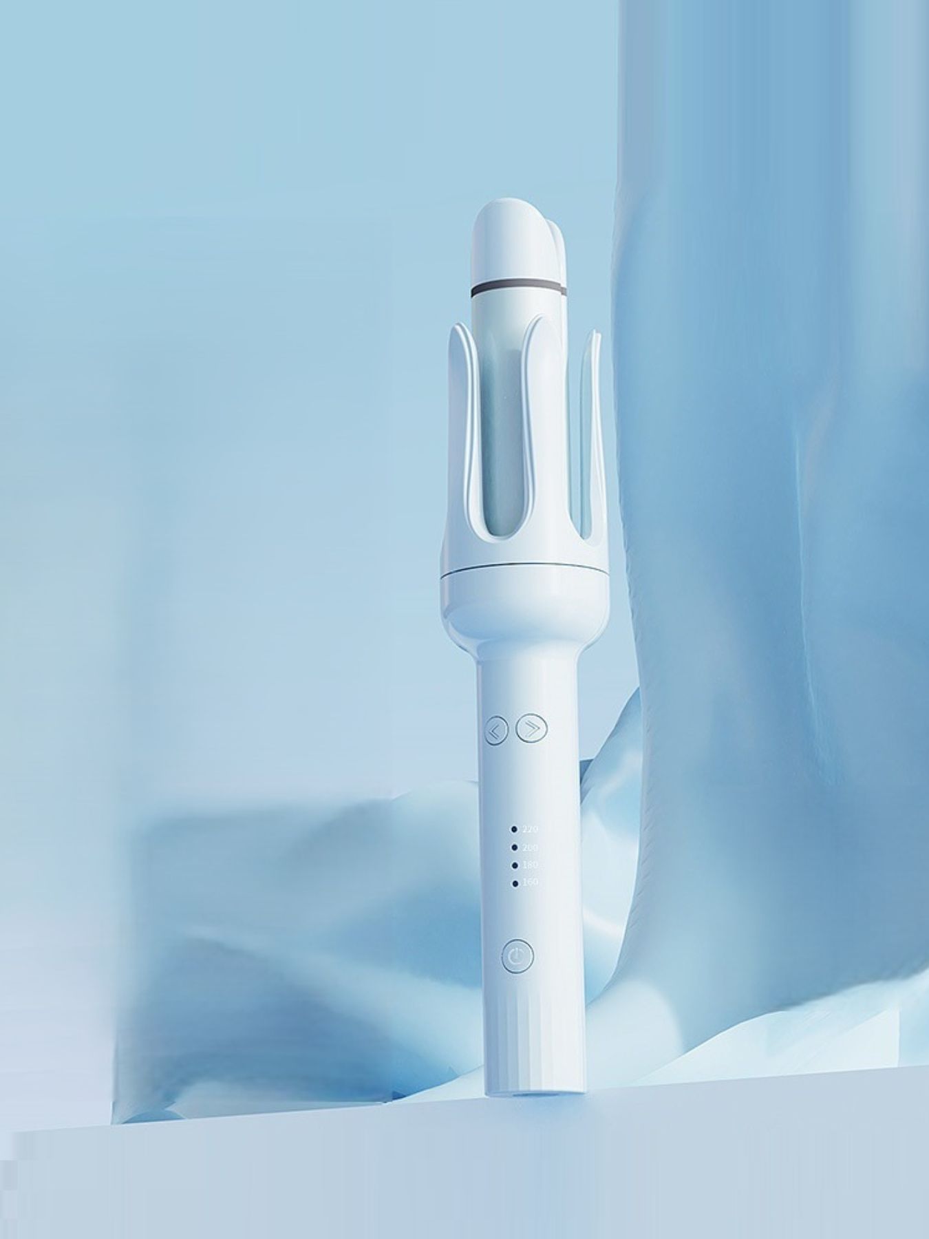 Blue Trendsi rotating ceramic hair curling iron with European plug, showcasing its ergonomic design and ceramic barrel for curls.