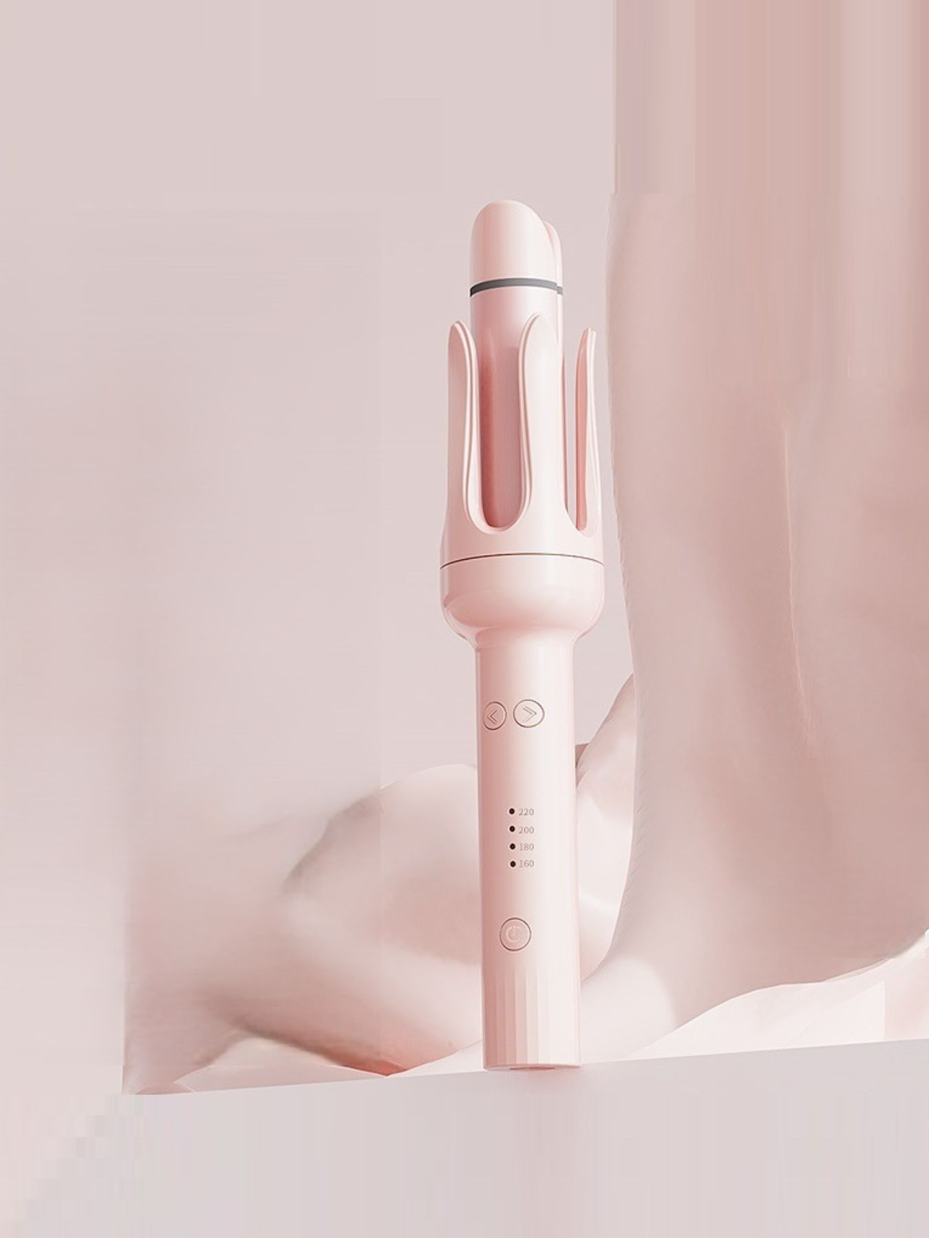 Blue Trendsi rotating ceramic hair curling iron with European plug for stylish, easy curling and styling.