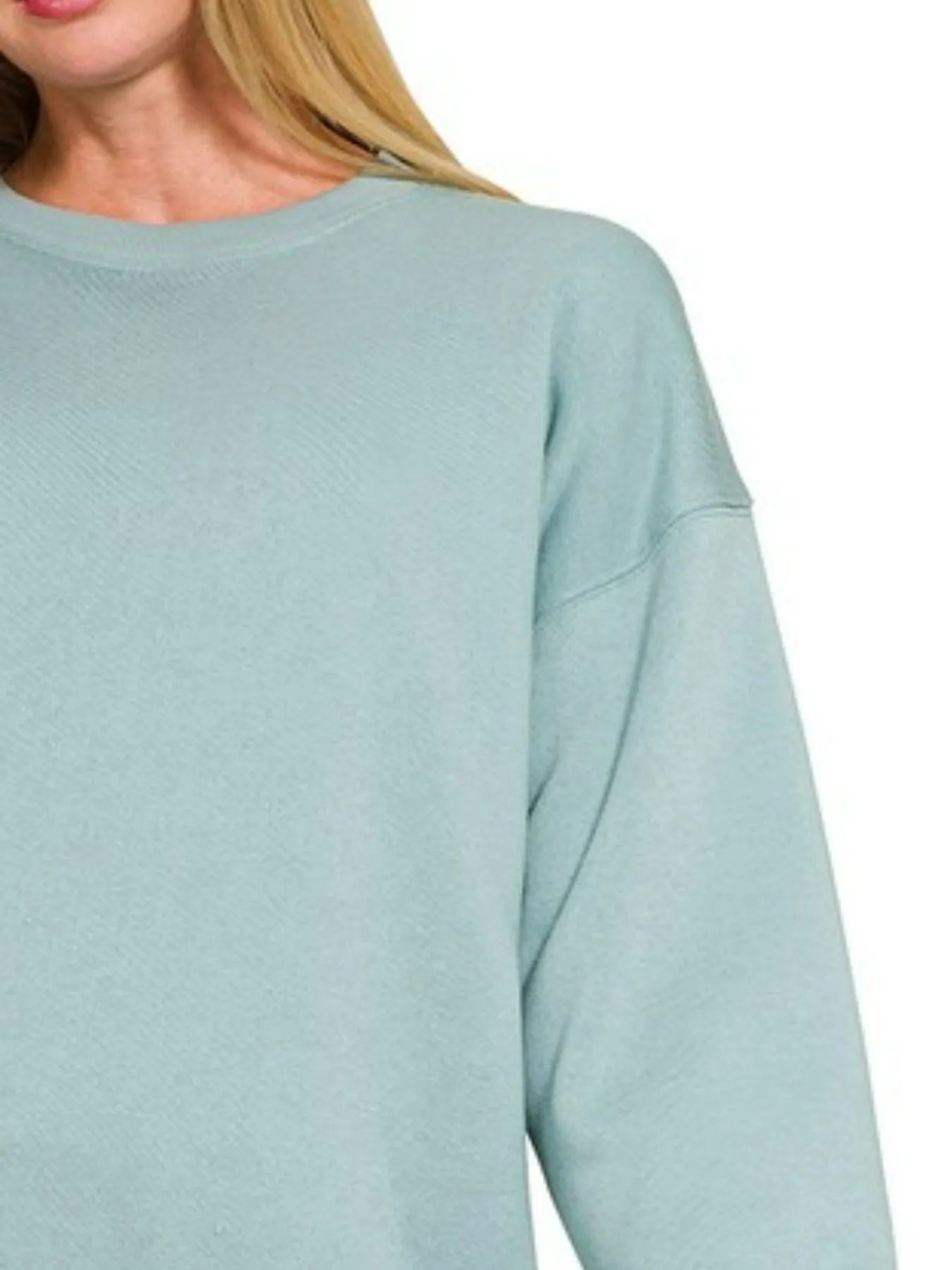 Blue-grey Zenana fleece round neck sweatshirt by Trendsi, with a cozy fit and casual style, shown on a model.