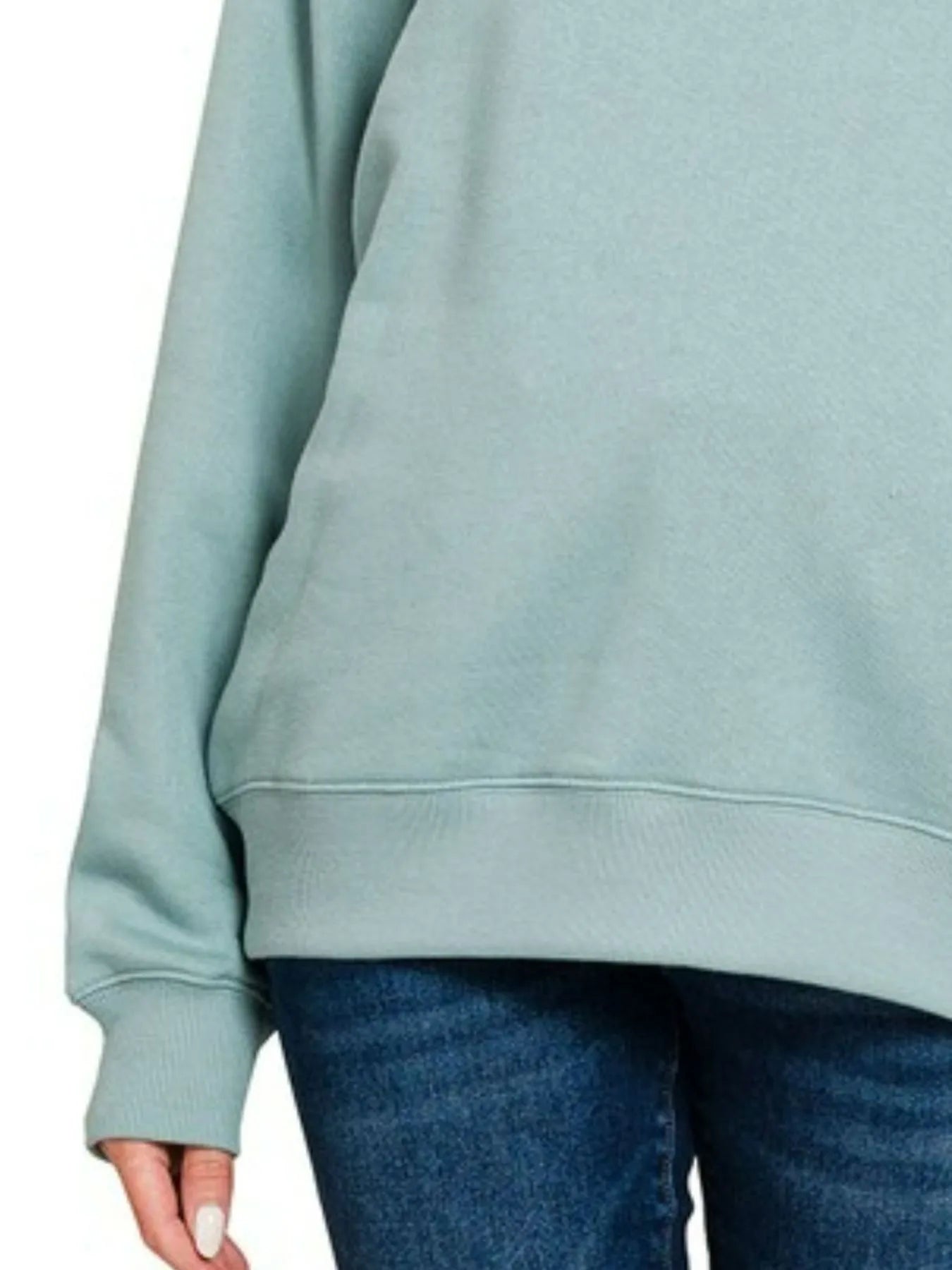 Blue-grey Zenana fleece round neck sweatshirt by Trendsi, showing a cozy, casual fit with long sleeves and ribbed cuffs.