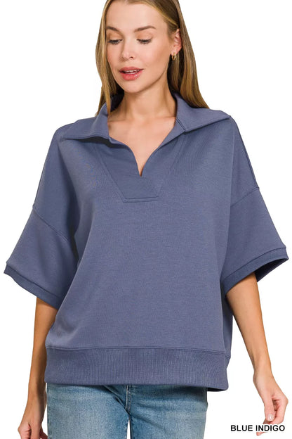 Blue Zenana scuba collared short sleeve pullover by Trendsi, featuring a relaxed fit and lightweight fabric for casual wear.